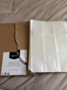 AmazonBasics 9-Pocket Card Protector Pages - White/Clear 75 sleeves left of pack